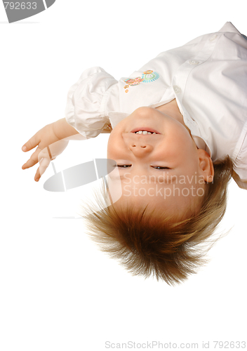 Image of Little girl hanging upside down