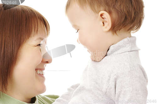 Image of Happy mother looking at her child