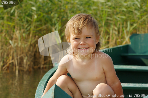 Image of Cute child on rowing boat
