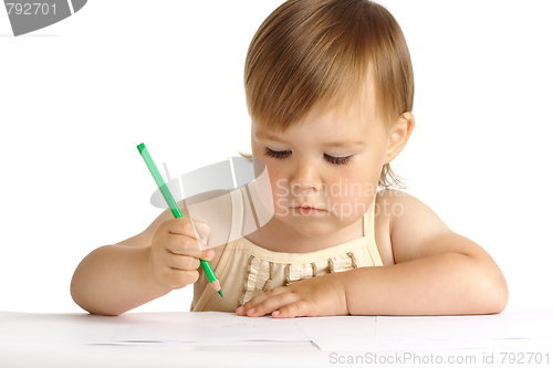 Image of Child draw with green crayon