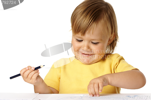 Image of Playful child draw with crayons and smile