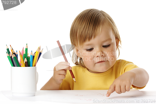 Image of Child points on his drawing