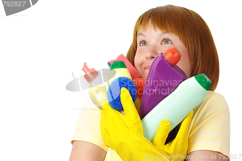 Image of Happy wife holding dish washing liquids