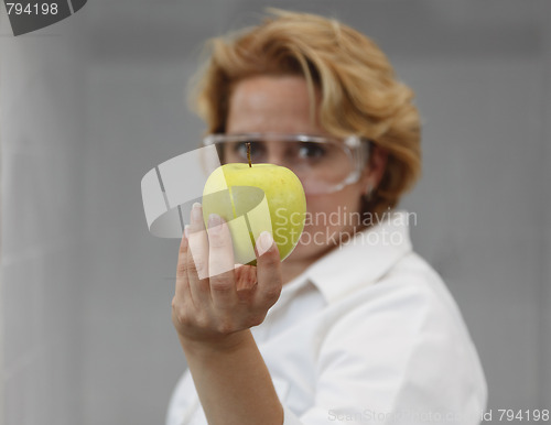 Image of Female Scientist Offering Natural Food