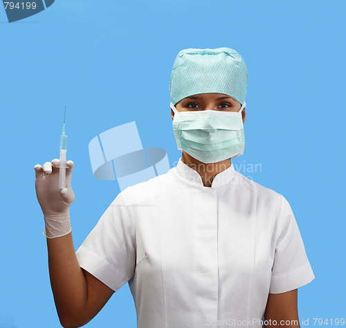 Image of Female nurse holding a syringe