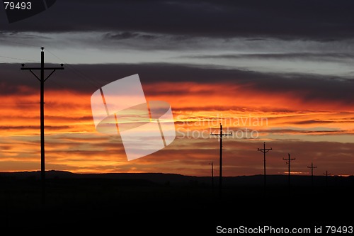 Image of powerlines sunset