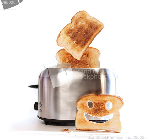 Image of Toaster with slices of toast 