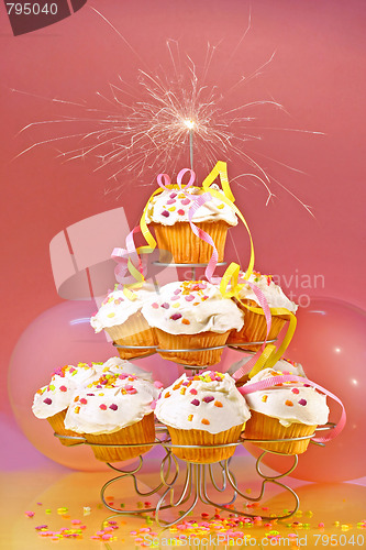 Image of Cupcakes with sparkler on top 