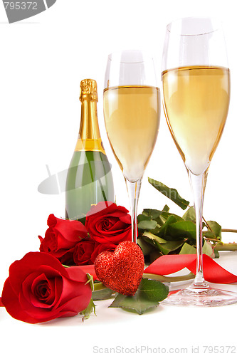 Image of Champagne glasses with red roses and little heart