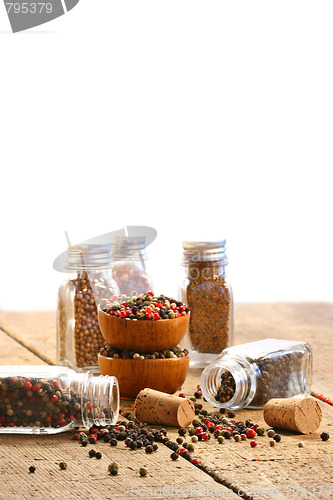 Image of Spice bottles on rustic table