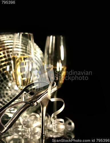 Image of Silver party shoe with glasses of champagne 