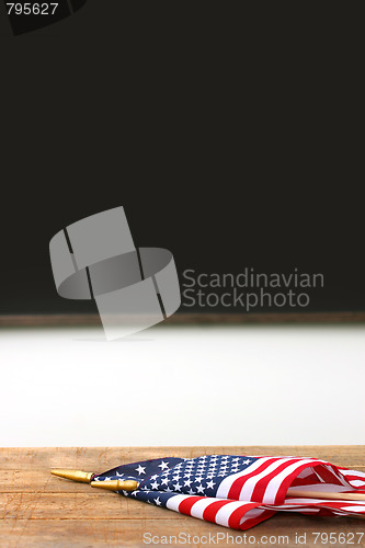 Image of American flags laying on school desk