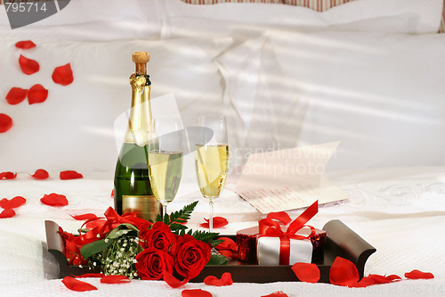 Image of Champagne in bed