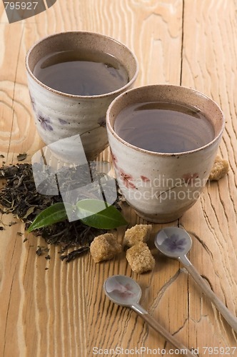 Image of green tea with fresh branch
