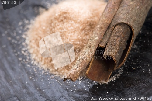 Image of aromatic spices with brown sugar - cinnamon