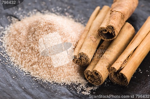 Image of aromatic spices with brown sugar - cinnamon