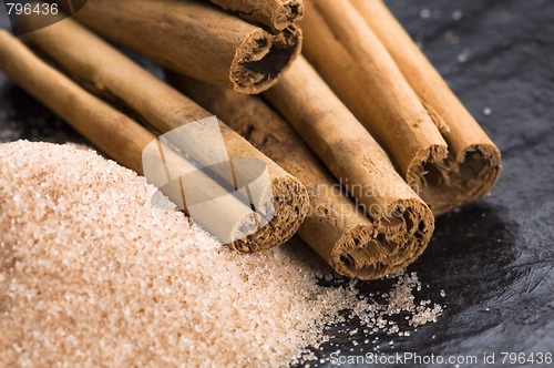 Image of aromatic spices with brown sugar - cinnamon