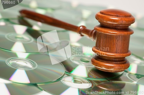 Image of CD ROM or DVD Discs and Gavel