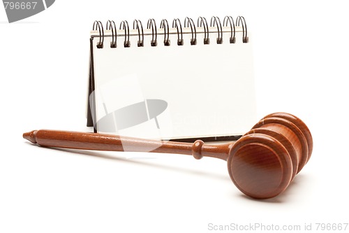 Image of Blank Spiral Note Pad and Gavel on White.