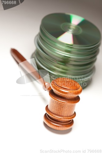 Image of Stack of CD Rom or DVD Discs and Gavel