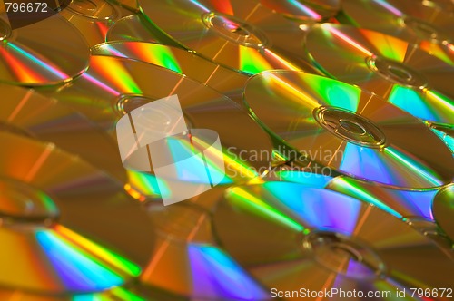 Image of Golden Data CDs or DVDs Background