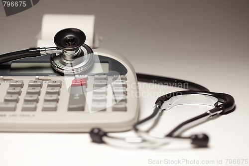 Image of Black Stethoscope on Calculator