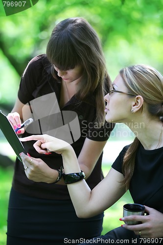 Image of businesswoman chief and secretary