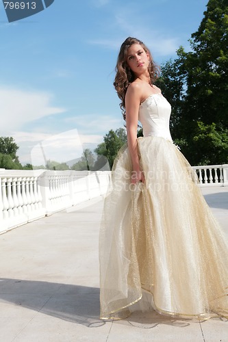 Image of pretty princess in white-golden gown