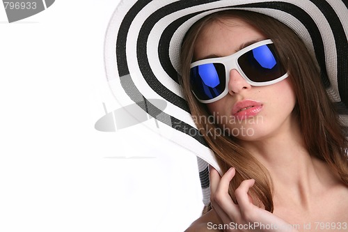 Image of young woman in striped hat