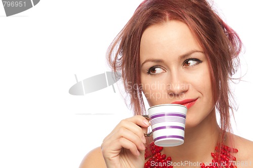 Image of Young woman with coffee cup