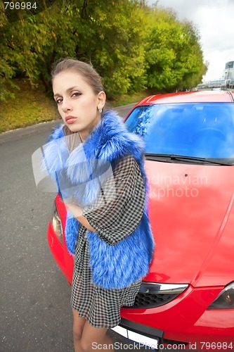 Image of woman and car