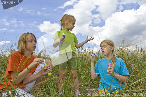 Image of Childrem blowing bubbles