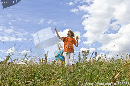 Image of Childrem blowing bubbles