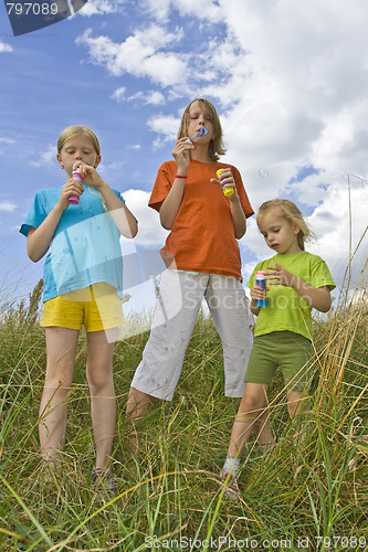 Image of Childrem blowing bubbles