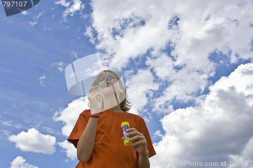 Image of Childrem blowing bubbles