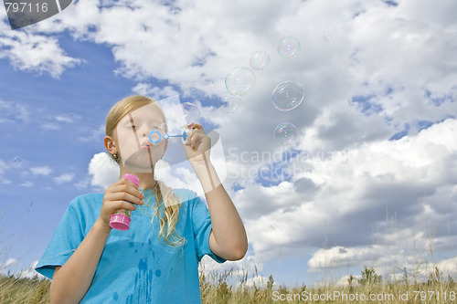 Image of Childrem blowing bubbles