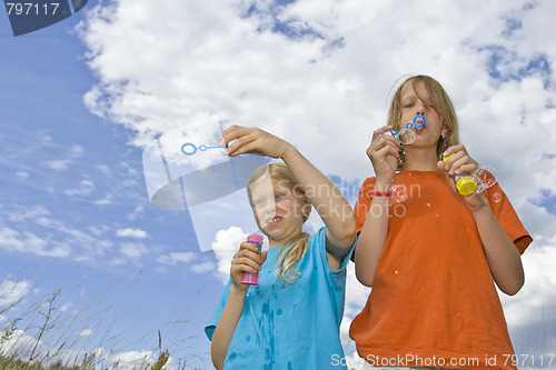 Image of Childrem blowing bubbles