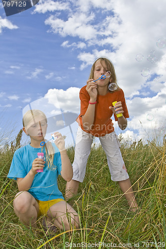 Image of Childrem blowing bubbles