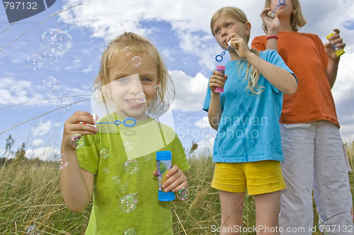 Image of Childrem blowing bubbles