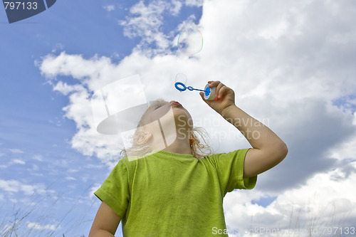 Image of Childrem blowing bubbles