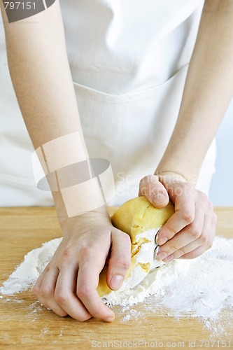 Image of Hands kneading dough