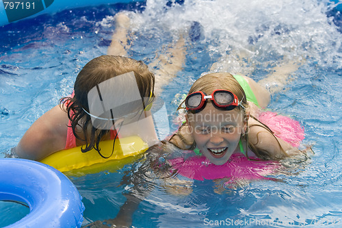 Image of Children in paddling pool