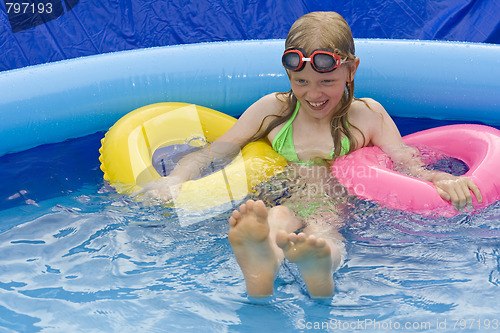 Image of Children in paddling pool