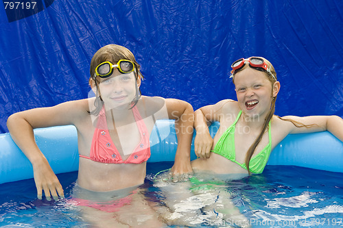 Image of Children in paddling pool