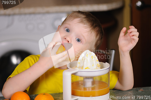 Image of The child to wring out juice