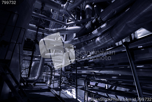 Image of Equipment, cables and piping as found inside of a modern industr