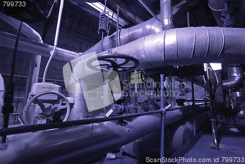 Image of Equipment, cables and piping as found inside of a modern industr