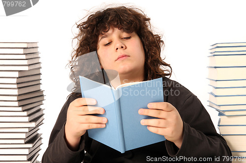 Image of boy reading a book 