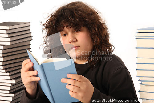 Image of boy reading a book 