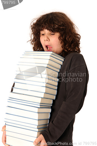 Image of boy carrying books 
